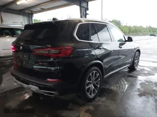 2019 BMW X5 xDrive40i with VIN 5UXCR6C59KLL12458, listed as a IAAI auction lot 41910665 with 80,287 mi miles. Bid and sale history available at carsss.com. Image 4.