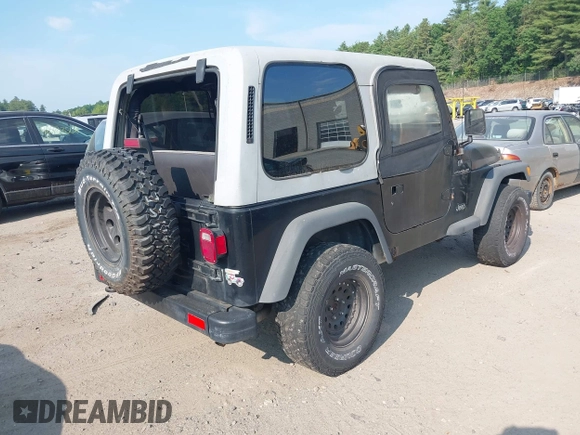 2000 Jeep Wrangler SE with VIN 1J4FA29P6YP791344, listed as a IAAI auction lot 42427688 with 184,549 mi miles and . Bid and sale history available at DreamBid. Image 4.