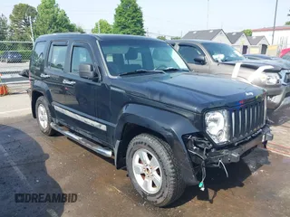 2012 Jeep Liberty Sport z VIN 1C4PJLAK6CW141606, wystawiony jako IAAI lot #42248052 z przebiegiem 120 670 mil mil oraz . Historia ofert i sprzedaży dostępna na DreamBid. Obrazek 1.