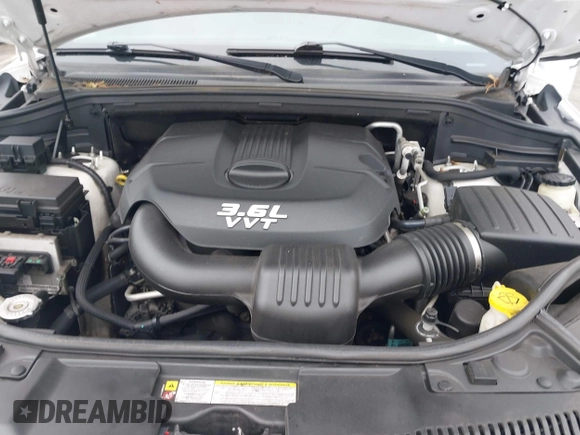 2013 Dodge Durango Crew with VIN 1C4RDJDG4DC518156, listed as a IAAI auction lot 42516880 with 162,402 mi miles and . Bid and sale history available at DreamBid. Image 10.