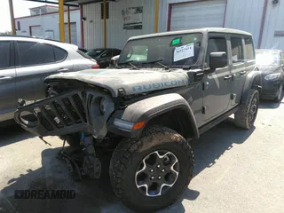 2022 Jeep Wrangler Unlimited Rubicon with VIN 1C4JJXR60NW182756, listed as a IAAI auction lot 36927414 with Not provided miles and . Bid and sale history available at DreamBid. Image 17.