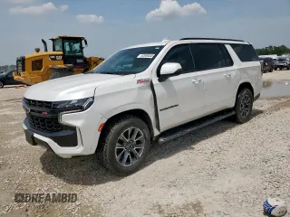 2023 Chevrolet Suburban Z71 z VIN 1GNSKDKD5PR442859, wystawiony jako Copart lot #62686035 z przebiegiem 42 313 mil mil oraz Szkoda całkowita • Salvage title. Historia ofert i sprzedaży dostępna na DreamBid. Obrazek 1.