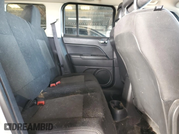 2014 Jeep Patriot Latitude with VIN 1C4NJRFB2ED665093, listed as a Copart auction lot 85868964 with 110,066 mi miles and Salvage title. Bid and sale history available at DreamBid. Image 11.