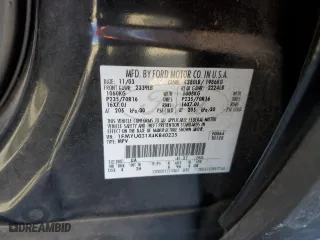 2004 Ford Escape XLT with VIN 1FMYU031X4KB40235, listed as a Copart auction lot 88357735 with 186,797 mi miles and Salvage Title. Bid and sale history available at carsss.com. Image 13.