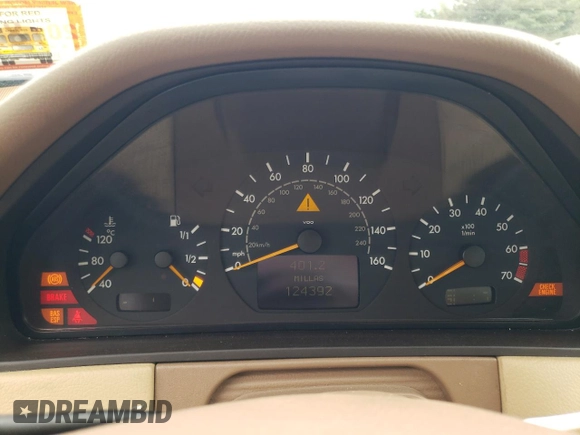 2001 Mercedes-Benz E-Class with VIN WDBJF65J01B389296, listed as a Copart auction lot 71933404 with 124,392 mi miles and Salvage Title. Bid and sale history available at carsss.com. Image 9.