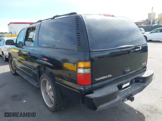 2004 GMC Yukon XL Denali with VIN 1GKFK66U34J125239, listed as a IAAI auction lot 40566893 with 1 mi miles. Bid and sale history available at carsss.com. Image 3.