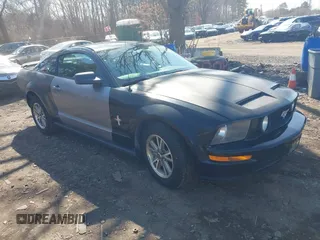 2005 Ford Mustang Deluxe with VIN 1ZVFT80N255143423, listed as a IAAI auction lot 41898144 with 115,863 mi miles. Bid and sale history available at carsss.com. Image 1.