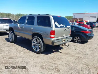 2001 GMC Yukon SLT with VIN 1GKEK13V11R220343, listed as a IAAI auction lot 41703786 with 213,518 mi miles. Bid and sale history available at carsss.com. Image 3.