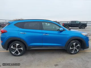 2016 Hyundai Tucson Eco with VIN KM8J3CA28GU041357, listed as a IAAI auction lot 41661997 with 87,000 mi miles. Bid and sale history available at carsss.com. Image 13.