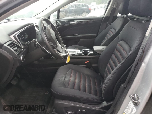 2016 Ford Fusion SE Hybrid z VIN 3FA6P0LUXGR350997, wystawiony jako Copart lot #62301825 z przebiegiem 267 537 mil mil oraz Szkoda całkowita • Salvage title. Historia ofert i sprzedaży dostępna na DreamBid. Obrazek 7.