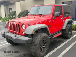 2015 Jeep Wrangler Sport with VIN 1C4AJWAG0FL750098, listed as a IAAI auction lot 41266454 with 77,115 mi miles. Bid and sale history available at carsss.com. Image 2.