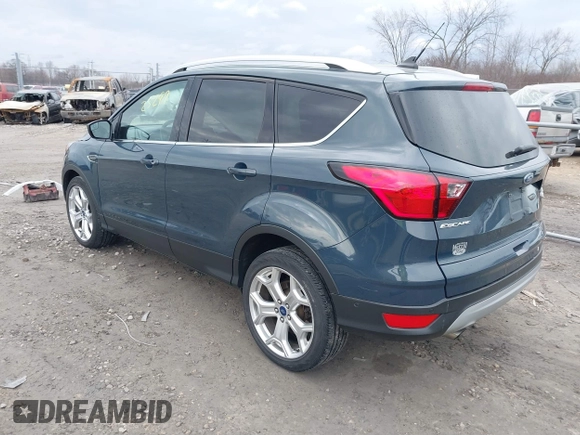 2019 Ford Escape Titanium with VIN 1FMCU9J95KUC28621, listed as a IAAI auction lot 41825297 with 60,373 mi miles. Bid and sale history available at carsss.com. Image 3.