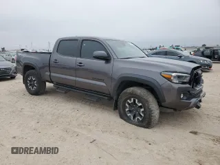 2021 Toyota Tacoma 4WD SR5 with VIN 5TFDZ5BN8MX062787, listed as a Copart auction lot 44987135 with 59,351 mi miles and Salvage Title. Bid and sale history available at carsss.com. Image 4.