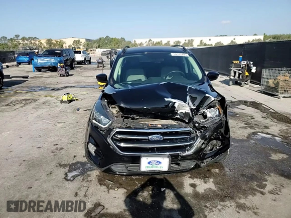 2018 Ford Escape SE z VIN 1FMCU9GD5JUB84551, wystawiony jako Copart lot #54515495 z przebiegiem 73 280 mil mil oraz Szkoda całkowita • Salvage title. Historia ofert i sprzedaży dostępna na DreamBid. Obrazek 15.