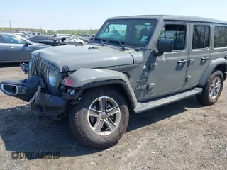 2022 Jeep Wrangler Unlimited Sahara with VIN 1C4HJXEM7NW206585, listed as a IAAI auction lot 42102516 with 10,769 mi miles and . Bid and sale history available at DreamBid. Image 2.