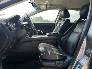2013 Mazda CX-9 Touring z VIN JM3TB3CV0D0409094, wystawiony jako Copart lot #58385885 z przebiegiem 201 153 mil mil oraz Tytuł czysty. Historia ofert i sprzedaży dostępna na DreamBid. Obrazek 7.