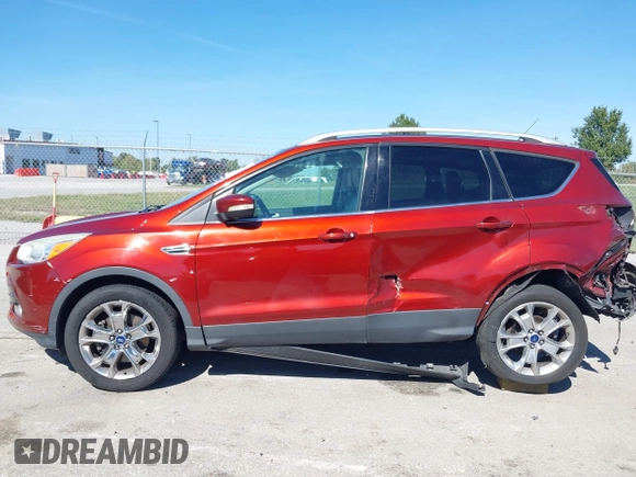 2015 Ford Escape Titanium with VIN 1FMCU9J92FUA53699, listed as a IAAI auction lot 40500310 with 197,581 mi miles. Bid and sale history available at carsss.com. Image 14.