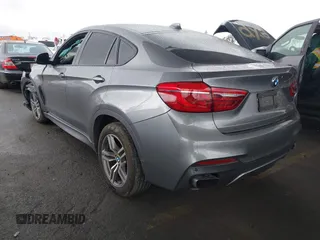 2016 BMW X6 xDrive50i with VIN 5UXKU6C59G0S82526, listed as a IAAI auction lot 41786622 with 110,796 mi miles and . Bid and sale history available at DreamBid. Image 3.