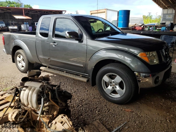 2007 Nissan Frontier Nismo with VIN 1N6AD06W57C439818, listed as a Copart auction lot 61210285 with 174,708 mi miles and Salvage title. Bid and sale history available at DreamBid. Image 4.