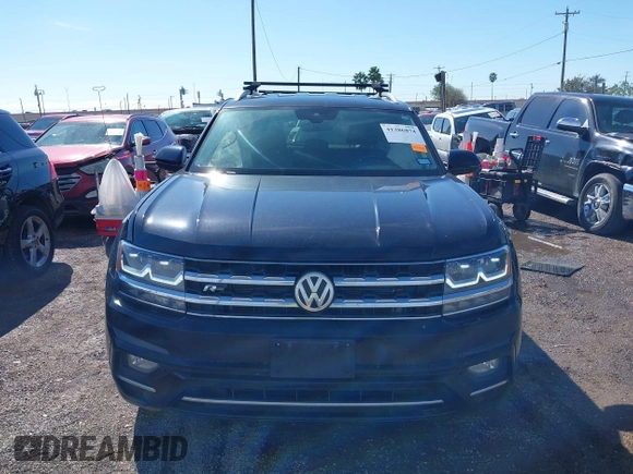 2018 Volkswagen Atlas SE with VIN 1V2FR2CA9JC537903, listed as a IAAI auction lot 41386874 with 118,764 mi miles and . Bid and sale history available at DreamBid. Image 13.