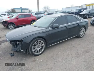 2012 Audi A8 с VIN WAUAVAFD0CN035731, выставлен на аукционе IAAI как лот 41286022 с пробегом 82 835 миль миль и . История ставок и продаж доступна на DreamBid. Изображение 21.