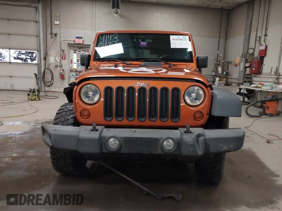 2011 Jeep Wrangler Rubicon with VIN 1J4BA6D15BL624268, listed as a IAAI auction lot 41430121 with 142,433 mi miles and . Bid and sale history available at carsss.com. Image 13.