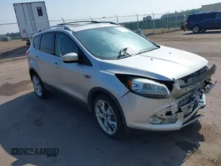 2013 Ford Escape Titanium z VIN 1FMCU9J91DUD68913, wystawiony jako IAAI lot #42515298 z przebiegiem 169 460 mil mil oraz . Historia ofert i sprzedaży dostępna na DreamBid. Obrazek 1.