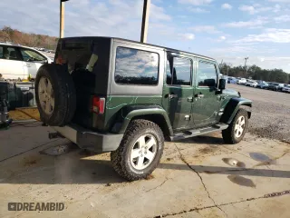 2011 Jeep Wrangler Unlimited Sahara with VIN 1J4BA5H15BL635016, listed as a Copart auction lot 84433444 with 124,217 mi miles and Salvage Title. Bid and sale history available at carsss.com. Image 3.