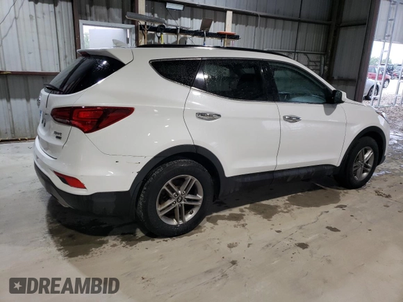 2017 Hyundai Santa Fe 2.4L z VIN 5XYZUDLB8HG422216, wystawiony jako Copart lot #58519075 z przebiegiem 138 395 mil mil oraz Czysty tytuł • Clean title. Historia ofert i sprzedaży dostępna na DreamBid. Obrazek 3.