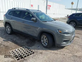 2021 Jeep Cherokee Latitude Lux with VIN 1C4PJLMXXMD203934, listed as a IAAI auction lot 41548713 with 64,746 mi miles. Bid and sale history available at carsss.com. Image 1.