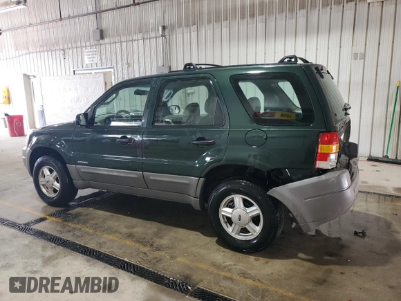 2002 Ford Escape XLS Value with VIN 1FMYU01B32KC48043, listed as a Copart auction lot 63011005 with 167,185 mi miles and Salvage title. Bid and sale history available at DreamBid. Image 2.