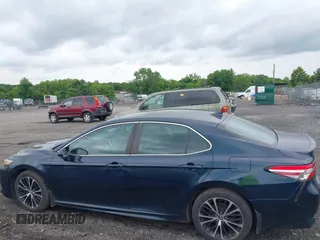 2019 Toyota Camry LE z VIN 4T1B11HK2KU738133, wystawiony jako IAAI lot #42499213 z przebiegiem 203 636 mil mil oraz . Historia ofert i sprzedaży dostępna na DreamBid. Obrazek 14.