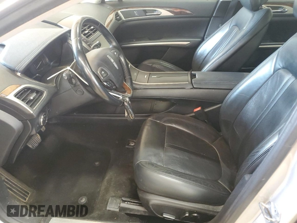2015 Lincoln MKZ Hybrid z VIN 3LN6L2LU1FR606066, wystawiony jako Copart lot #61955415 z przebiegiem 127 214 mil mil oraz Szkoda całkowita • Salvage title. Historia ofert i sprzedaży dostępna na DreamBid. Obrazek 7.