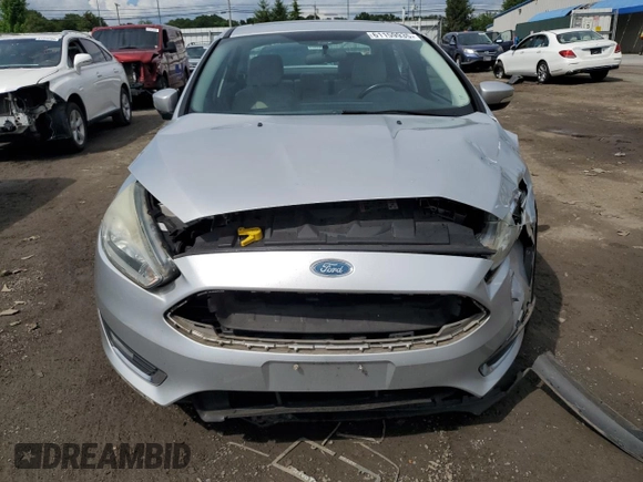 2015 Ford Focus Titanium with VIN 1FADP3J27FL285842, listed as a Copart auction lot 61159935 with 79,215 mi miles and Salvage title. Bid and sale history available at DreamBid. Image 5.
