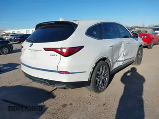 2022 Acura MDX w/Technology Package with VIN 5J8YD9H45NL009674, listed as a IAAI auction lot 41251825 with 38,635 mi miles. Bid and sale history available at carsss.com. Image 4.