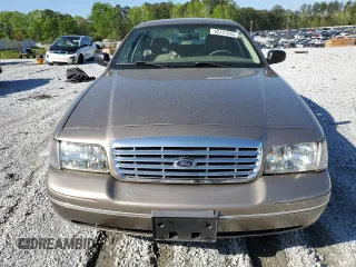 2005 Ford Crown Victoria LX z VIN 2FAFP74WX5X166506, wystawiony jako Copart lot #52141265 z przebiegiem 117 686 mil mil oraz Szkoda całkowita • Salvage title. Historia ofert i sprzedaży dostępna na DreamBid. Obrazek 5.