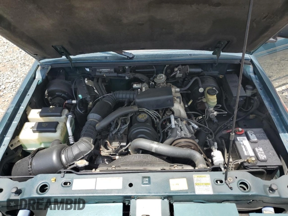 1997 Ford Ranger XLT z VIN 1FTCR10A1VUB21797, wystawiony jako Copart lot #59839605 z przebiegiem 145 266 mil mil oraz Szkoda całkowita • Salvage title. Historia ofert i sprzedaży dostępna na DreamBid. Obrazek 11.
