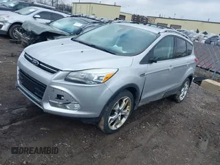2013 Ford Escape Titanium with VIN 1FMCU9J90DUC22888, listed as a IAAI auction lot 41664550 with 185,568 mi miles and . Bid and sale history available at DreamBid. Image 2.