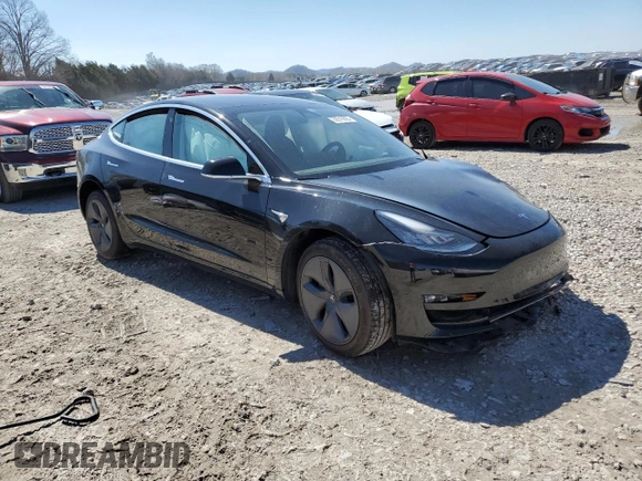 2020 Tesla Model 3 Standard Range Plus with VIN 5YJ3E1EA4LF784677, listed as a Copart auction lot 50515825 with Not Provided miles and Salvage Title. Bid and sale history available at DreamBid. Image 4.