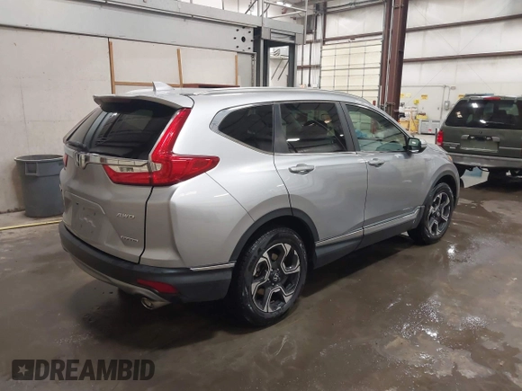 2017 Honda CR-V Touring with VIN 2HKRW2H90HH603307, listed as a IAAI auction lot 41868564 with 81,144 mi miles. Bid and sale history available at carsss.com. Image 4.