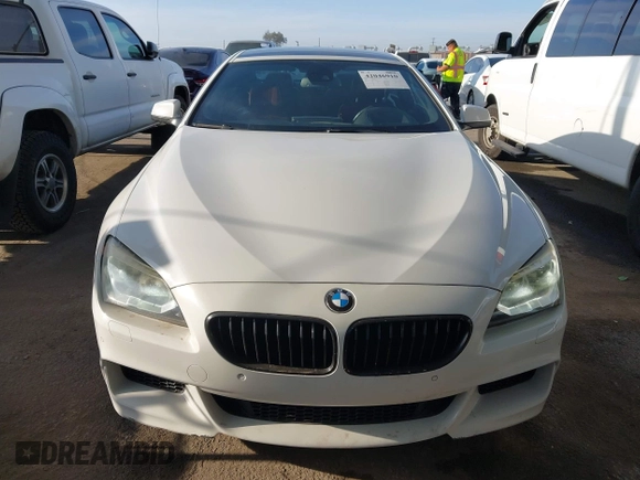 2012 BMW 6 Series 650i with VIN WBALX3C52CC528401, listed as a IAAI auction lot 42046910 with 105,844 mi miles. Bid and sale history available at carsss.com. Image 13.