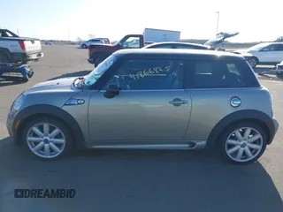 2007 MINI Hardtop S with VIN WMWMF73567TL91385, listed as a IAAI auction lot 41866865 with 114,778 mi miles and . Bid and sale history available at DreamBid. Image 14.