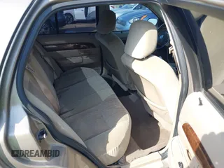 2004 Mercury Grand Marquis GS z VIN 2MEFM74WX4X643435, wystawiony jako IAAI lot #41932119 z przebiegiem 274 468 mil mil oraz . Historia ofert i sprzedaży dostępna na DreamBid. Obrazek 8.