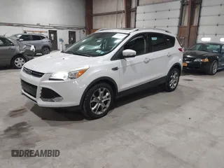 2016 Ford Escape Titanium with VIN 1FMCU9J95GUB02377, listed as a IAAI auction lot 41869557 with 88,441 mi miles. Bid and sale history available at carsss.com. Image 2.