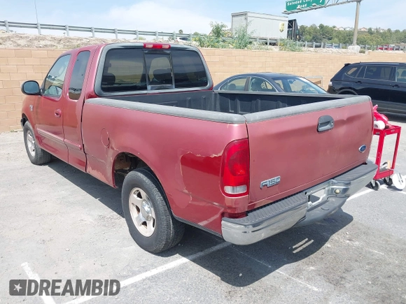 2002 Ford F-150 XL with VIN 1FTRX17LX2NB30978, listed as a IAAI auction lot 41979756 with 225,030 mi miles. Bid and sale history available at carsss.com. Image 3.