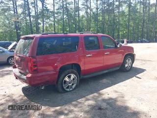 2012 Chevrolet Suburban LT with VIN 1GNSKJE78CR262094, listed as a IAAI auction lot 42167052 with 276,886 mi miles. Bid and sale history available at carsss.com. Image 4.