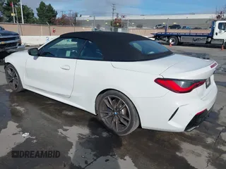 2022 BMW 4 Series M440i with VIN WBA53AT02NCJ20674, listed as a IAAI auction lot 41200398 with 28,235 mi miles and . Bid and sale history available at DreamBid. Image 3.