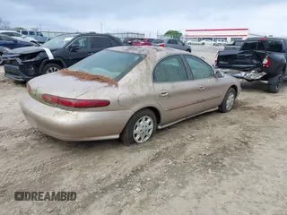 1999 Mercury Sable GS with VIN 1MEFM50U4XG601278, listed as a IAAI auction lot 41940748 with Not Provided miles and . Bid and sale history available at DreamBid. Image 4.