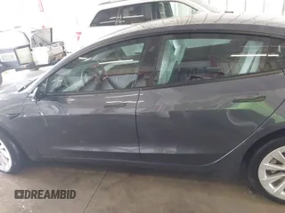 2023 Tesla Model 3 z VIN 5YJ3E1EA2PF591661, wystawiony jako IAAI lot #42014086 z przebiegiem 13 945 mil mil oraz . Historia ofert i sprzedaży dostępna na DreamBid. Obrazek 14.