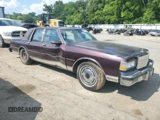 1987 Chevrolet Caprice z VIN 1G1BU51H7H9156079, wystawiony jako Copart lot #60443124 z przebiegiem 44 452 mil mil oraz Szkoda całkowita • Salvage title. Historia ofert i sprzedaży dostępna na DreamBid. Obrazek 4.